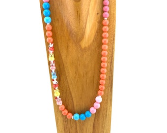 Ceramic bunnies with colorful pastels in long beaded necklace