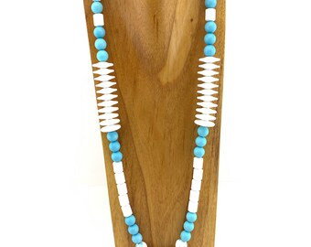 White ceramic teal-splattered beads with lots of vintage beads in long necklace