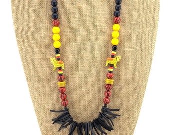 Tiger hand-painted carved wood beads with black wood spikes