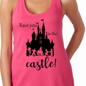 May include: Pink racerback tank top with a black silhouette of Cinderella's castle and the text "Race you to the castle!" with the number 13.1.