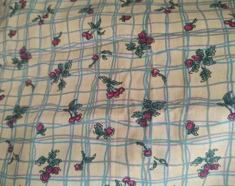 Strawberries and Cherries on a trellis. Yellow background. 2 yds +4" by 46" wide.