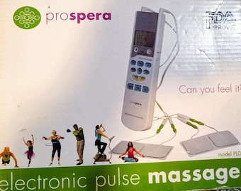 Electronic PULSE MASSAGER! Got back pain?  Easy to use. Instructions included. Opened but not used.