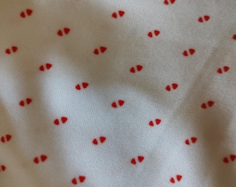 Tiny RED ARROWS in bright white background. Feels like polycotton with good stretch width. Slight stretch length. From LIDA Mfg. Co. Marquis