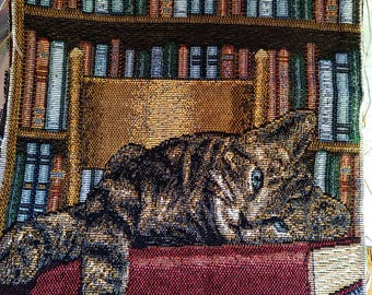 Tapestry of a Darling Lazy Tabby Cat on a Bookcase! So cute!! Just hem or add a fabric backside, or frame it! 14" square. 8 people favorited