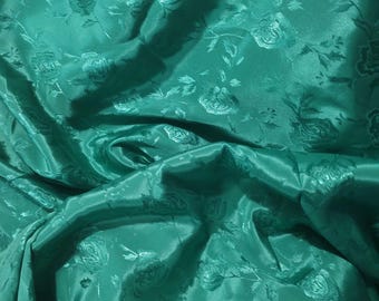Nice feel of this LUXURIOUS IRISH GREEN faux silk charmeuse in a Floral design. 3 yd +3" x 45"" w. Slinky for drapes skirts or blouse Kaftan