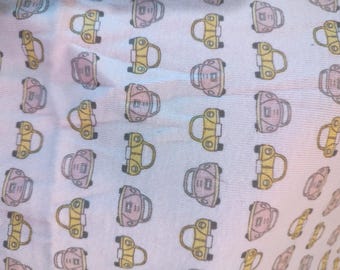 Fantastic find! Small VOLKSWAGEN cars in rows. Pink cotton jersey knit. Stretchy width only. Feels like a good cotton T-shirt 56Lx52W 1 lb.