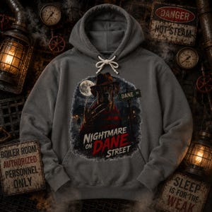 May include: A charcoal gray hooded sweatshirt featuring a graphic print of a Great Dane dog wearing a fedora and a bladed glove. The text reads Nightmare on Dane Street, with a full moon and a street sign in the background of the illustration.