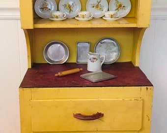 toy kitchen cupboard