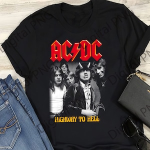 May include: Black t-shirt featuring a red and yellow AC/DC logo and a black and white photograph of the band. The text "Highway to Hell" is printed in yellow below the photo.