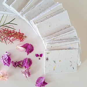 Box of 100 Sheets of 2.5 x3.5" Handmade Recycled Paper in Neutral tones, many with botanicals throughout