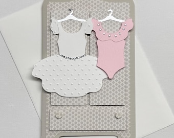 Ballet Dresses Hanging on a Wardrobe