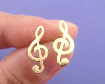 ト音記号の音符モチーフのスタッドピアス（ゴールド） - Etsy 日本