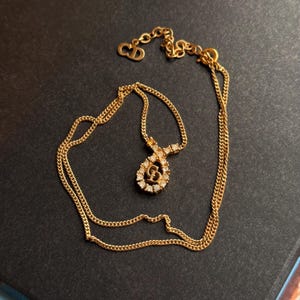 Vintage Christian Dior signed gold-plated teardrop CD logo clear rhinestones pendant drop necklace 1980s
