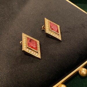 Vintage Christian Dior signed gold-plated red marble rhinestone diamond shape clip-on earrings
