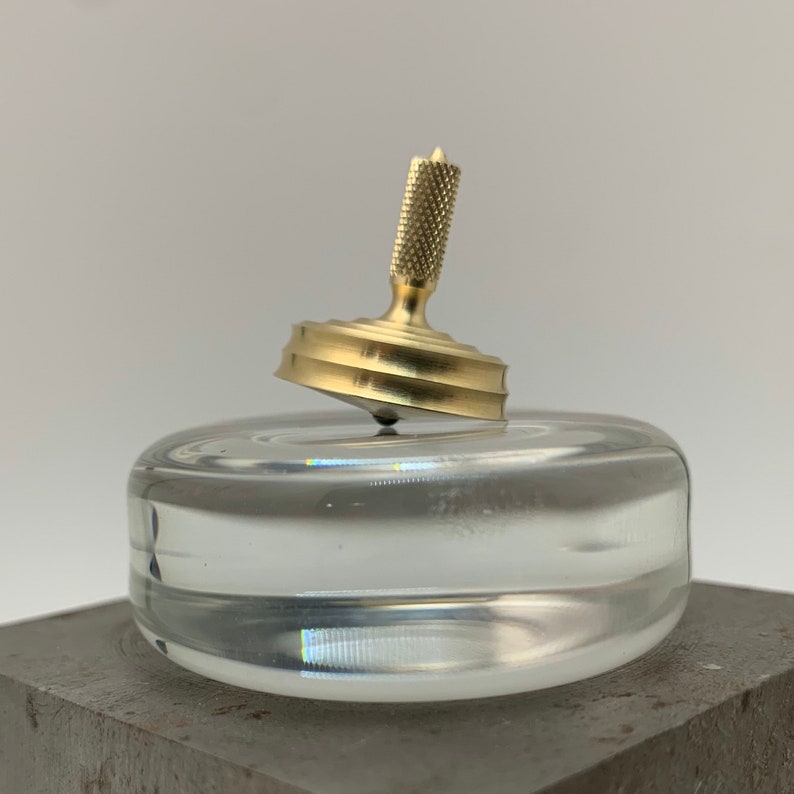 brass spinning top