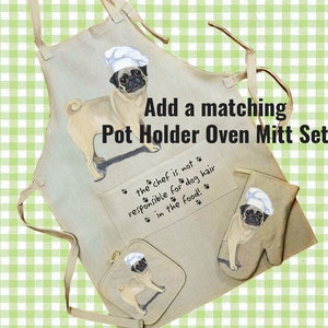 May include: A beige kitchen apron with a pug wearing a chef's hat. The apron has a pocket with the text "the chef is not responsible for dog hair in the food!" and a matching pot holder and oven mitt set with the same pug design.