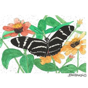 May include: Watercolor painting of a zebra longwing butterfly with black and white striped wings, perched on an orange and yellow flower. Green leaves and other flowers surround the butterfly. The artist's signature is in the bottom right corner.