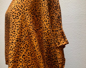 Silk handdyed orange cheetah  print box  top. Handdyed orange Shibori dyed silk top. Boxy silk top