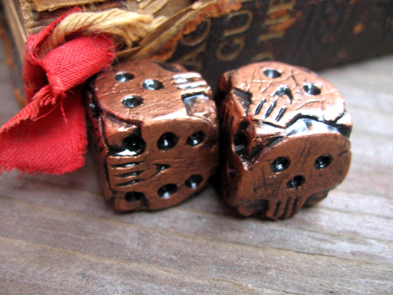 hand cast copper color skull dice oogie boogie dice geek