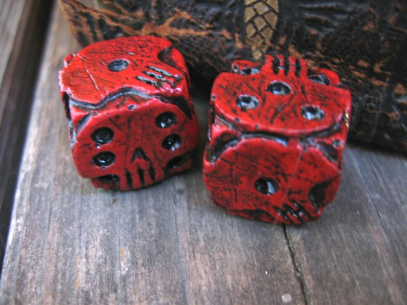 hand cast red skull dice oogie boogie nightmare movie dice
