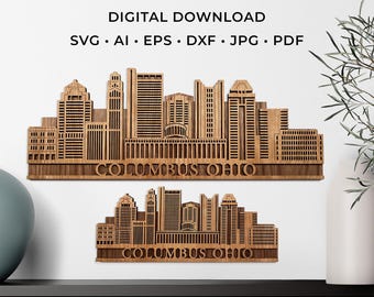 May include: Two wooden laser-cut skyline art pieces of Columbus, Ohio, with detailed building silhouettes. The larger piece is above the smaller one. Text at the top reads "LASER CUT FILE DIGITAL DOWNLOAD". The city name is carved at the bottom of each piece.