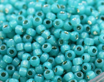 AIKO Precision Cylinder Beads  Turquoise Opal Silver Lined Perma Finish # PF2104