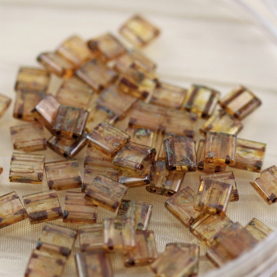 Transparent Dark Topaz Picasso - Tila, Miyuki 5.2g Transparent Dark Topaz Picasso - Tila, Miyuki 5.2g