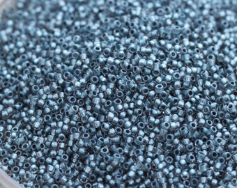 20 g 15/0 lichte rosaline/metallic blauw gevoerde Toho-rocailles, microrocailles, Toho 288