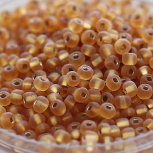 RARE!!! 70g 6/0 Matte Dark Gold / Silver Lined Czech Seed Beads, 70grams, frosted finish, fabulous firefly effect, rich color...