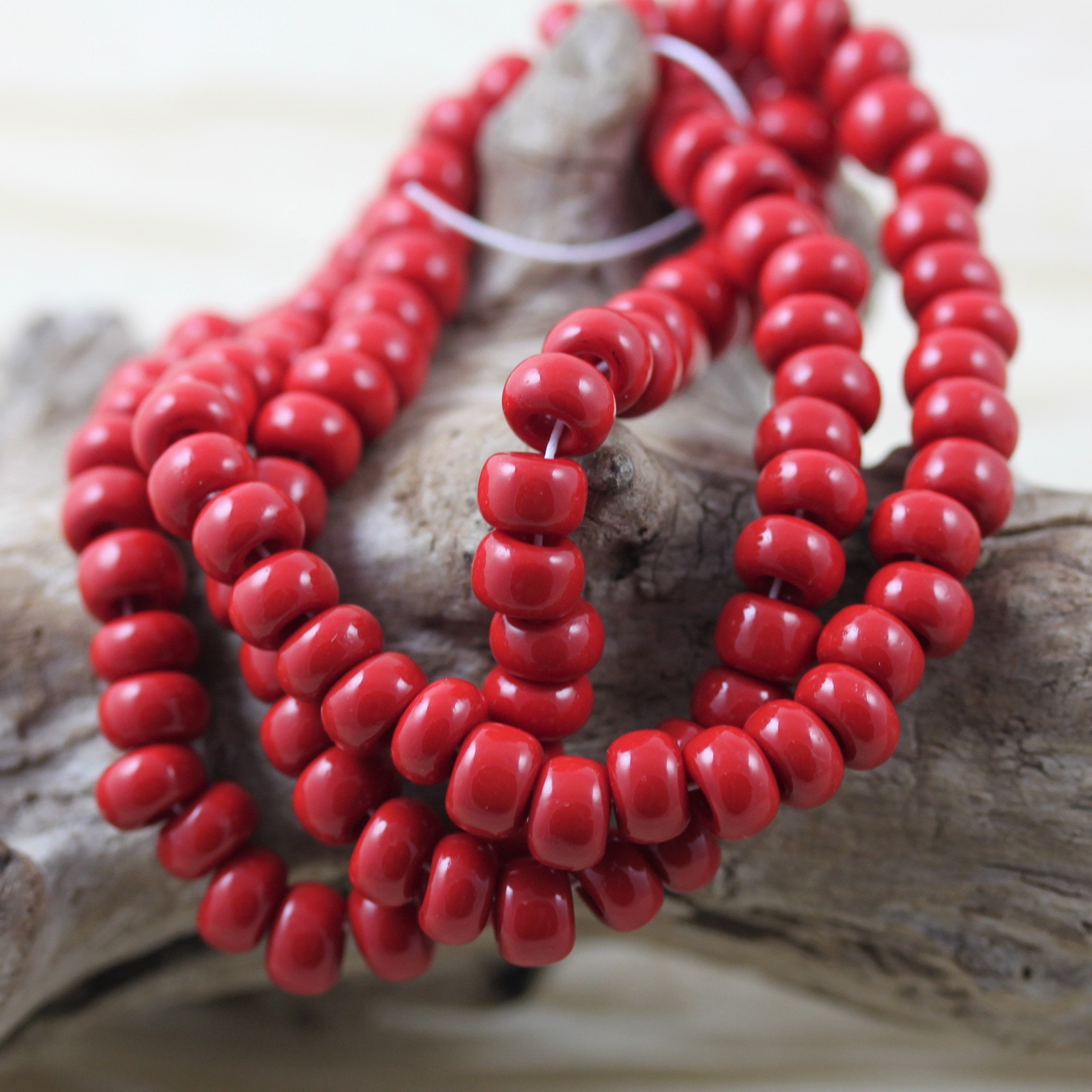 Strand old bohemian crow trade beads red 