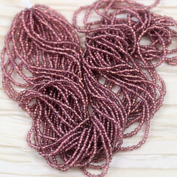 11/0 Light Amethyst / Copper Lined Czech Seed Beads, full hank -12/20", fabulous firefly effect, rich color and coppery shimmer...