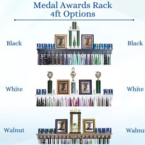 May include: A display rack for medals and awards, available in black, white, and walnut finishes. The rack features shelves for trophies, framed certificates, and medal display. The text on the image reads "Medal Awards Rack 4ft Options."