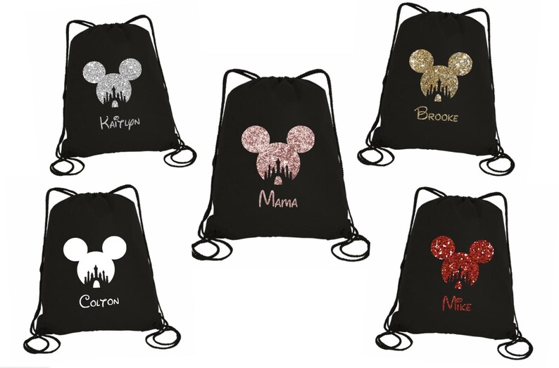 May include: Six black drawstring bags with different glitter Mickey Mouse designs and names. The names are Kaitlyn, Brooke, Mama, Colton, Mike.