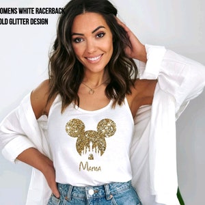 May include: White racerback tank top with a gold glitter Mickey Mouse head design and the word "Mama" underneath.