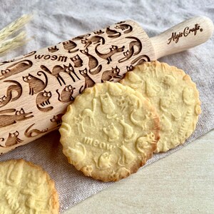 Rouleau à pâtisserie en céramique décoré de chats miaulants, idéal pour les pâtisseries maison. Création Algis Crafts.