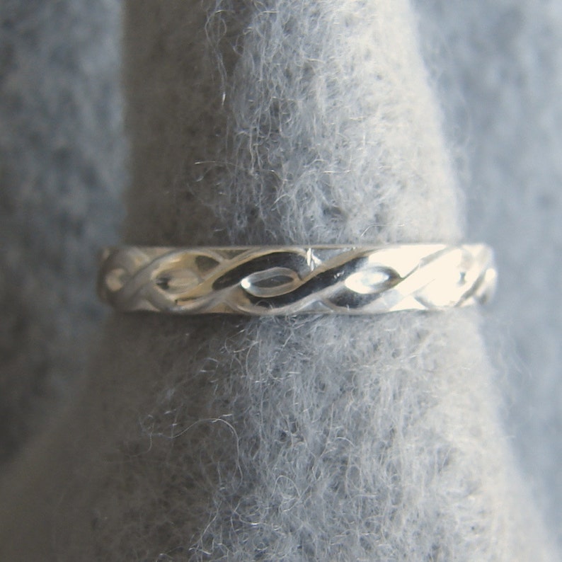 Celtic weave his and her band highlighted shiny silver Alabama silversmith oxidized Woven Classical Traditional Sterling Wedding Ring