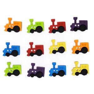 May include: A collection of twelve colorful train-shaped buttons. Each button features a locomotive design with a black wheel and a chimney. The buttons are in various colors, including orange, green, red, purple, blue, and yellow.