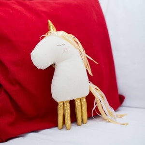 Christmas gold unicorn doll
