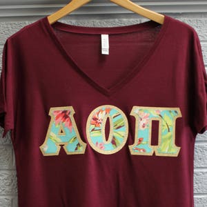 Alpha Omicron Pi Maroon Bella Flowy V-Neck With Amy Butler Bliss Bouquet on Gold Metallic (254C)