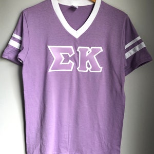 Lavender V-Neck Two Stripes With Lavender Sewn On Letters On White