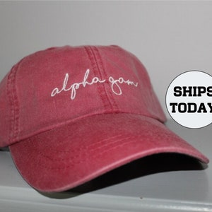 Red Alpha Gamma Delta Hat Embroidered in White Script
