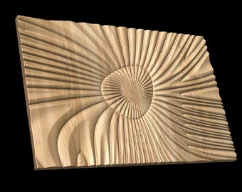 May include: A wooden wall panel with a carved, swirling pattern. The pattern is reminiscent of a flower or a sunburst. The panel is light brown in color and has a natural wood grain.