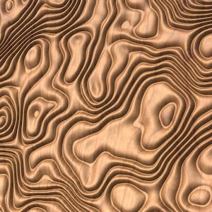 May include: A close-up of a wooden surface with a carved pattern of swirling lines and curves. The wood is a light brown color and the pattern is raised and textured.