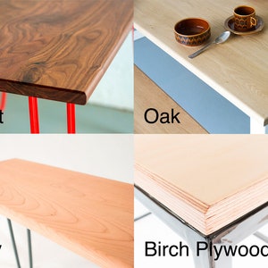 May include: Four different types of wood tabletops: walnut, oak, cherry, and birch plywood. The tabletops are shown with different colored metal legs.