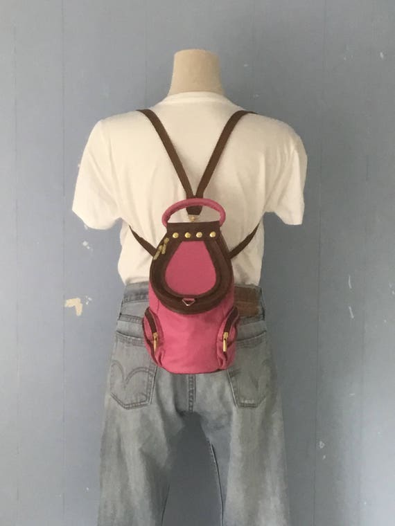 small pink leather backpack
