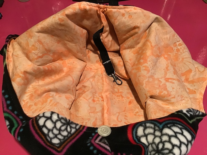 Puppy Snuggle Sack-black background with variegated hearts