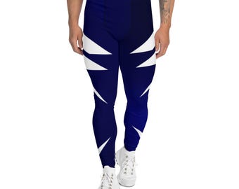 May include: Navy blue leggings with a white geometric pattern. The leggings have a tight fit and are made of a stretchy material.