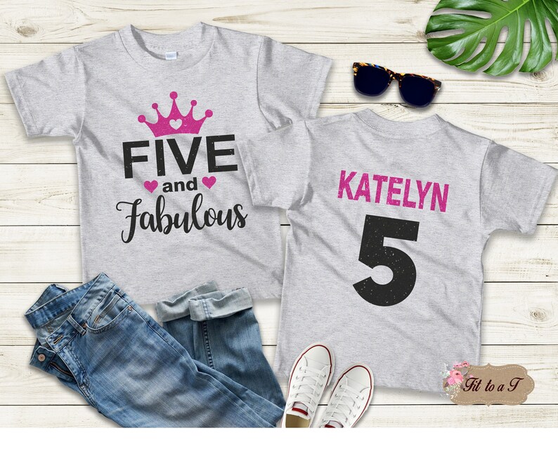 Personalized 5th birthday girl shirt featuring a pink crown and “Five and Fabulous” design on the front, with a custom name and number 5 on the back. Gildan unisex birthday tee.