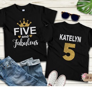 Personalized 5th birthday girl shirt featuring a pink crown and “Five and Fabulous” design on the front, with a custom name and number 5 on the back. Gildan unisex birthday tee.