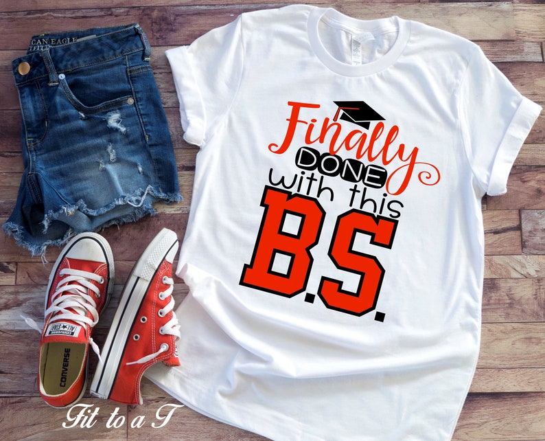 May include: White t-shirt with red and black text that says "Finally done with this BS."  The text is in a playful, handwritten font.  The shirt is being modeled with denim shorts and red sneakers.